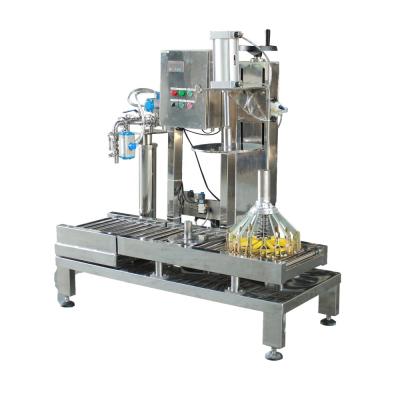 China Beverage Weighing Filling And Sealing Machine For Liquid Automatic Paint Filling Machine for sale