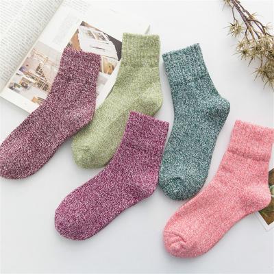 China Good Quality Sustainable Cheap Price Fashion Retro Woolen Socks Women Winter Thick Warm Tube Woolen Socks for sale