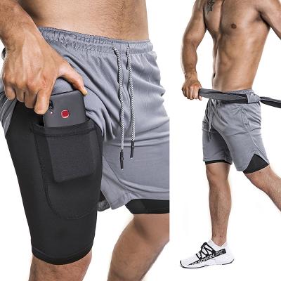 China Men's Outdoor Loose Casual Multi Functional Quick Dry Quick Dry Board Sports Fitness Shorts With Built In Pocket for sale