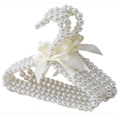 China 20CM Pearl Hanger Bow Tie Fashion Dog Hanger Kids Hanger Sustainable Plastic for sale