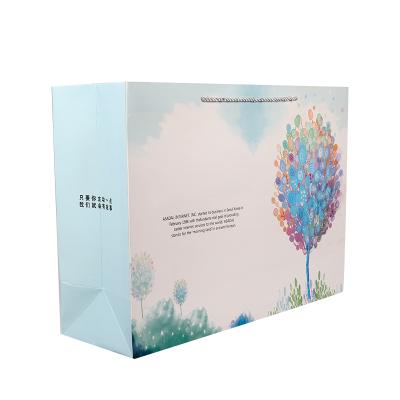 China Recyclable Custom Printed Custom Paper Bag Boutique Gift Packaging Bag Commercial Shopping Paper Bag for sale