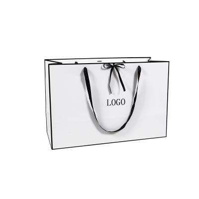 China Recyclable Wholesale Custom Logo White Paper Bag High End With Reasonable Price Gift Color Paper Packaging Bags For Cosmetic Bag for sale