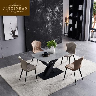 China Nordic minimalistic marble dining table fixed iron dining table creative dining table and chair combination apartment for sale