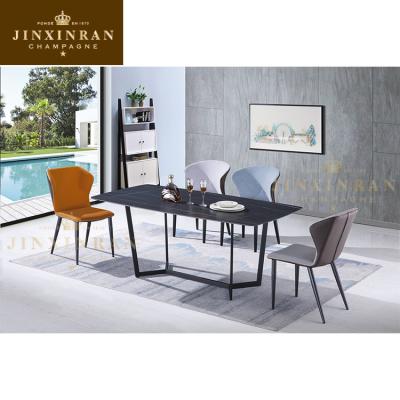 China Cheap Modern Classic Extendable 10 Seat Luxury Black Dining Table Long With Chairs Marble Look Ceramic Top Dining Table Set for sale