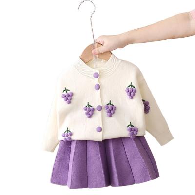 China Chinese style girls fall korean knitted cardigan two piece sweaters new baby style by fruit skirt sweater set girls for sale