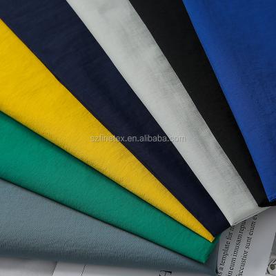 China Water Resistant Recycled 228T Full Ply Nylon Fabric Matte Taslan PU Coated for sale