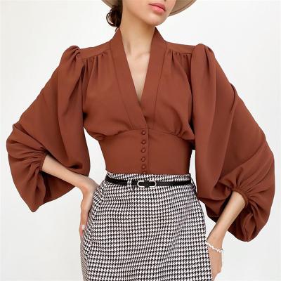 China Anti-Wrinkle Autumn Lantern Sleeve V-Neckline Winter Solid Elegant Black Women Blouse White Casual Shirts for sale