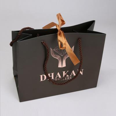 China Recyclable Brand Logo Luxury Black Shopping Kraft Art Paper Packing Manufacturers Wholesale Printed Custom Gift Bags for sale