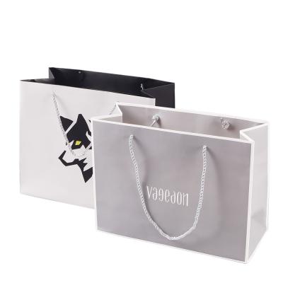 China OEM Recyclable Free Sample Customized Gold Foil Logo Luxury Paper Gift Bags For Hair Extension Packaging for sale