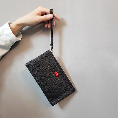 China NO New ladies purse lychee color pattern long card cherry wallet purse fashionable pure women handbag for wom 2023 for sale