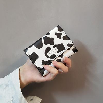 China NO Dairy Cow Pattern Cute Trendy Student Fashion Pu Coin Purse Women Small Women Ladies Cards Bag Women's Wallet for sale