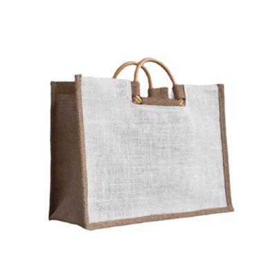 China Retro Eco-friendly Fashion Jute Tote Bag Rattan Wood Handle Empty Canvas Gift Shopping Bags With Custom Logo for sale