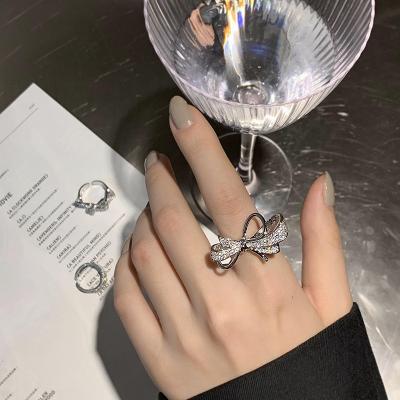 China FASHIONABLE Most Popular Bow Knot Jewelry Zirconia Ring Gold Plated Finger Ring Open Ladies Ring Gold Plated for sale