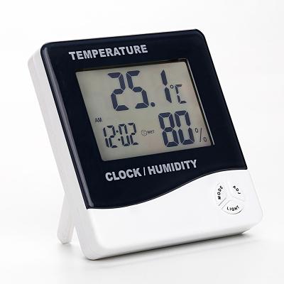 China High Precision Mini Electronic Digital Alarm Clock Thermometer Indoor Wall Mounted Hygrometer for sale