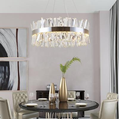 China New Post Modern Modern Round Dining Chrome LED Lamp Stainless Steel Luxury Golden Crystal Hanging Chandeliers for sale