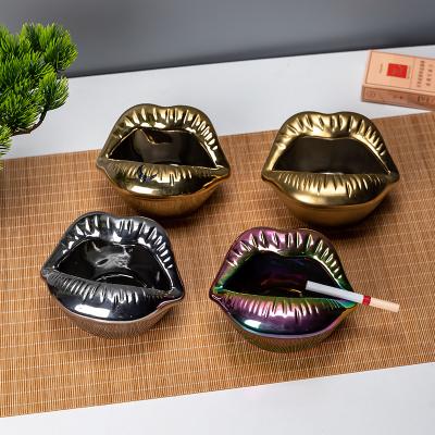 China Creative original ceramic ashtray design fashion lip lip ashtray ceramic patented products electroplate for sale