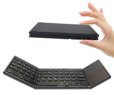 China Trackpad Keyboard Supports Three System Foldable Thin Mini BT Keyboard for sale