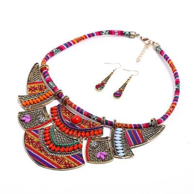 China Hiphop 2021 Europe and the United States exaggerated women's retro ethnic wind resin rice bead tribal earwork + necklace two sets 100 for sale