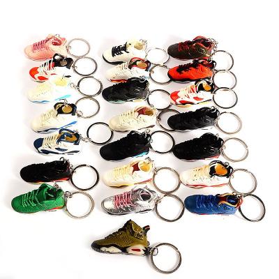 China Promotion gift dropshipping 1/6 SCALE Mini Shoe Handcrafted Sneaker 5CM Long and Height 3D Sneaker Key Chain Plastic Material Keychains for sale