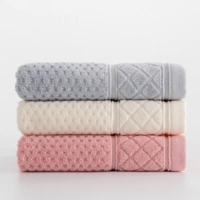 China Eco-friendly Jacquard Face Towel Roll 100%cotton Eco-friendly Bathroom Towel Set for sale