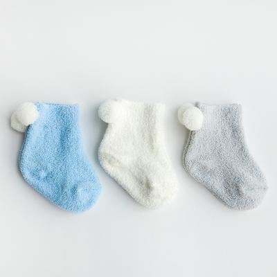 China New QUICK DRY autumn and winter thickened baby socks 0-1-3 warm solid color fleece baby coral ball an for sale