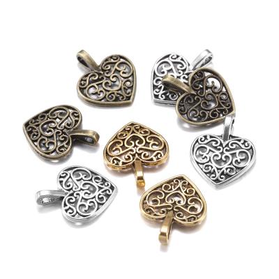 China 30pcs/lot Vintage Tibetan Silver Bronze Plated Hollow Out Heart Pendants Antique Findings DIY Charms Bracelet Jewelry Making Dropshipping for sale