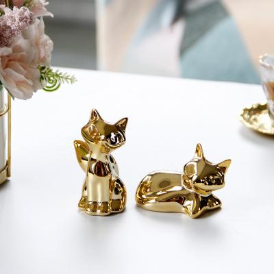 China Fascinating simple and cute gold ceramic home decoration ornaments abstract mini small fox crafts for sale