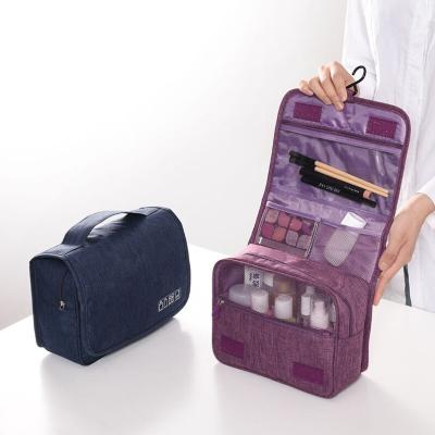 China Fashion New Customized Hanging 300D Polyester Travel Toiletry Bag Cosmetic Bag Make Up Organizer for sale