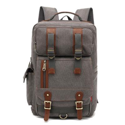 China Daybackpaack Multi-pockets Vintage Travel Leisure Drawstring Men Leather Canvas Outdoor Hiking Backpacks Backpack for sale