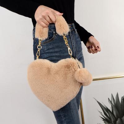 China Fashion Chic Bag One Key Pas D'Ave Chaine Cher Rabbit Plush Fur Heart Bag With Fur Ball for sale