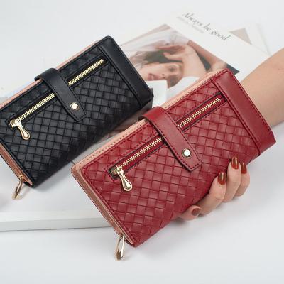 China Eco-friendly new fashion trend Taninsy ladies clutch bag pull strap buckle multi-card purse long woven wallet for wom for sale