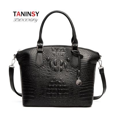 China Large Capacity Taninsy Fashion Swap Messenger Lady Handbag Color Women Lady Bags Retro Handbag for sale