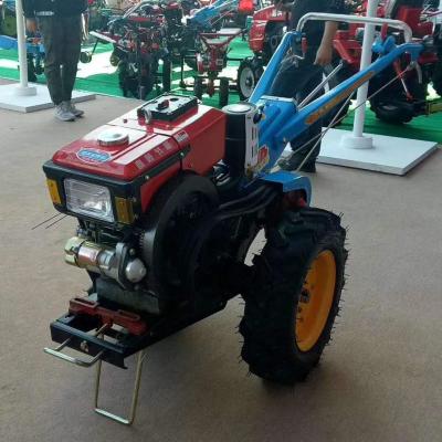 China Farms china equipment cheap small farm 12hp walking tractor 2 wheels with tiller and plow for sale for sale