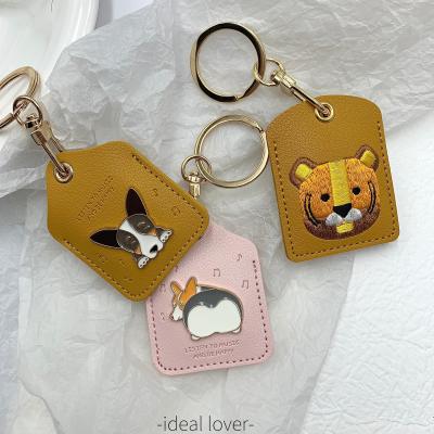 China Promotion Gift New Luxury Square Leather Car Key Chain With Embroidery And Tiger Dog Badge for sale