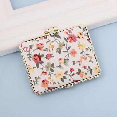 China Vintage Mirror Work Cloth Double Sided Balance Makeup Mirror Double Sided Mini Folding Handheld Portable Make Up Elegant Dressing Table Mirror for sale