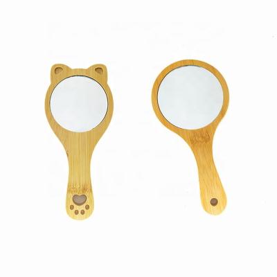 China New Design Cat Paw Round Hand Bamboo Wood Pocket Custom Cute Beauty Makeup Handheld Clear Glass Mirror High Mirror for sale