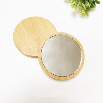 China Customized Customized Logo Wooden Bamboo Round Pocket Makeup Hand Mirror For Women for sale