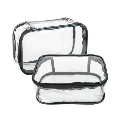 China Eco Fashion Clear Transparent Waterproof Traveling Mini Clear Cosmetic Bag With Handle for sale