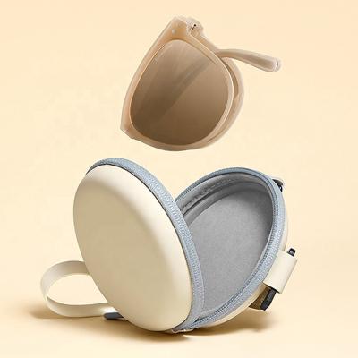 China Fashion sunglasses 2021 hot sale easy foldable fashion high quality glass new wear sunglasses with cases for sale