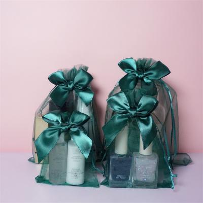 China Wholesale Drawstring Gift Bag Assorted Colors Bowknot Design Mesh Transparent Cosmetic Gift Organza Bags Jewelry Packaging Luxury Organza Bags for sale