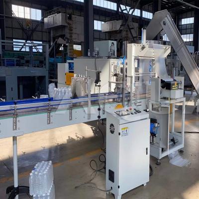 China Full Automatic Food Shrink Film PE Printed Wrap Machine / Can Shrink Packaging Line for sale