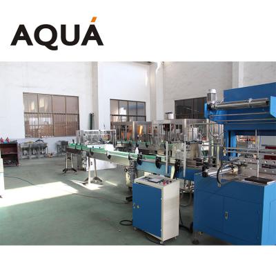 China food PE heat shrink wrap machine/automatic PE film shrink paper wrapping machine for sale