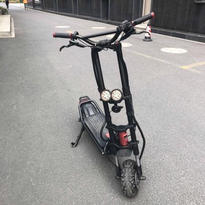 China Wolf Warrior Fastest 2400w 60v Unisex Durable Adult Electric Scooter Long Range Dual Motor for sale