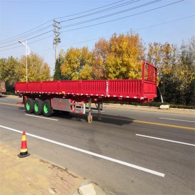 China High Quality 3 Axle 4 Axle Truck Trailer Hot Selling Cargo Hauling Barrier Flatbed Semi Truck Trailer Side Wall for sale