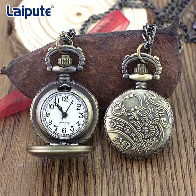 China Exquisite Embossed Vintage Pocket Watch Clock With 27mm Dial Coin Sized for sale