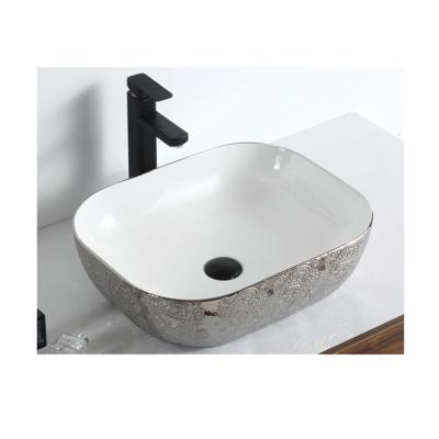 China Hotel Eco-friendly Popular Bathroom Commercial Ceramic Sink No Hole Art Silver Basin Solid Color Table Top Outdoor Sink for sale