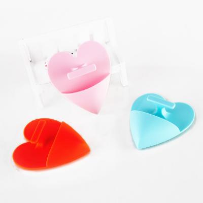 China HeaLeanLo Exfoliators Silicone Heart Shape Wash Face Brush Silicone Bristle Brush How To Use Brush Facial Wash With Scrub Pad for sale