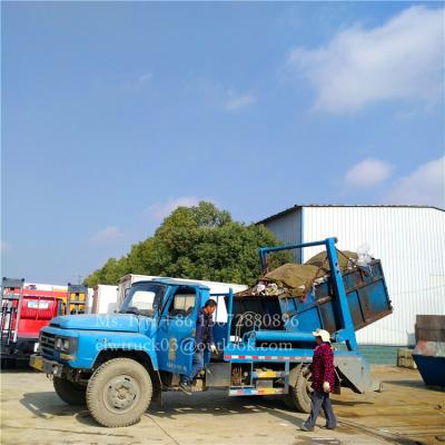 China environmental hygiene; 6-8 Ton Swing Arm Dump Garbage Truck Manufacturers Sanitation Refuse Collector for sale