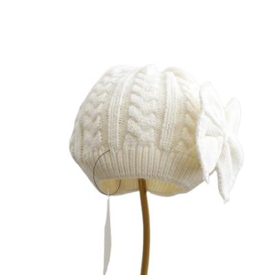 China Fashion Bow Design Winter Baby Hat Casual Cute Warm Kid Knitted Hat Beanie Hat for sale