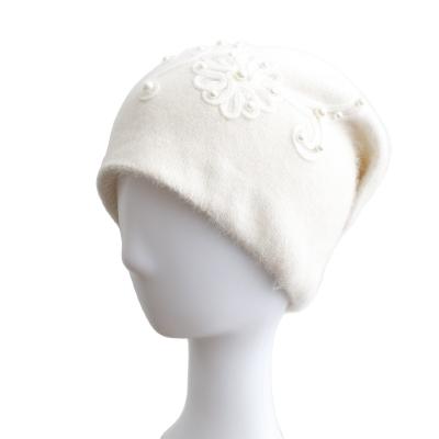 China New Design JOINT Pearl Flower Knit Women Hat Fashion Warm Beanie Hat Winter for sale